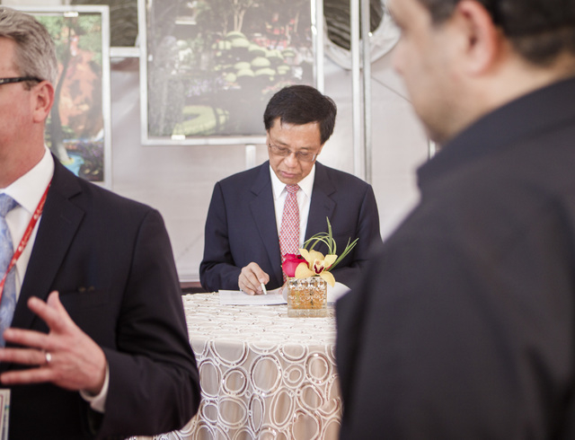 K.T. Lim, chairman,left, and CEO of Genting Group, works on his speech during the groundbreaking of the $4 billion Resorts World Las Vegas resort property, the site of the former Stardust hotel- ...