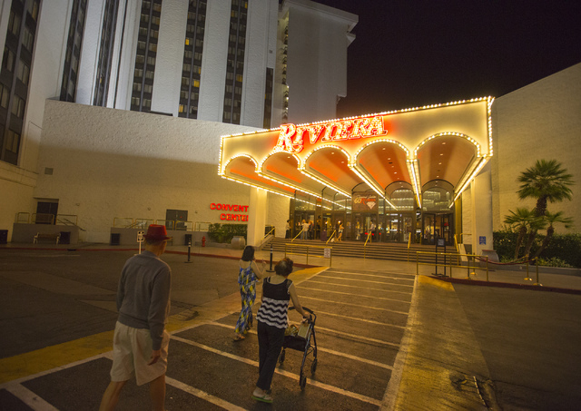 People walk toward the east entrance of the Riviera hotel-casino, 2901 Las Vegas Blvd. South, on Monday, April 20, 2015.  The resort will close Monday,May 4, to make room for Las Vegas Convention  ...