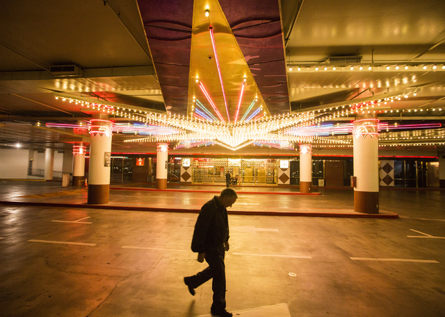 A man walks at the west valet entrance at the Riviera hotel-casino, 2901 Las Vegas Blvd. South, on Monday, April 20, 2015. The resort will close Monday, May 4, to make room for Las Vegas Conventio ...