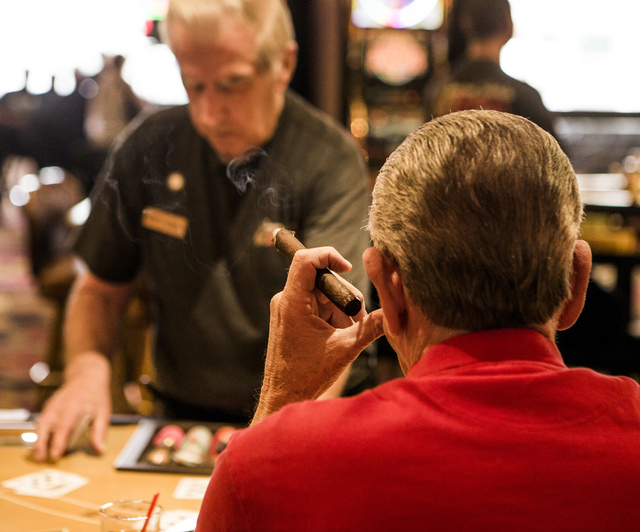 A man plays blackjack at the Riviera hotel-casino, 2901 Las Vegas Blvd. South, on Wednesday, April 23,2015. The resort will close Monday, May 4, to make room for Las Vegas Convention Center expans ...