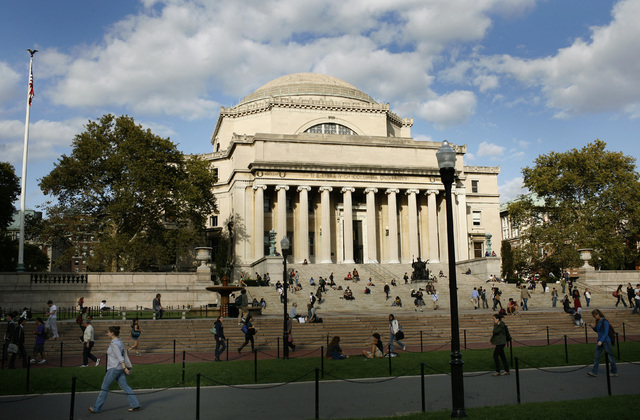 Students walk across the campus of Columbia University in New York, October 5, 2009. (Mike Segar/Reuters)