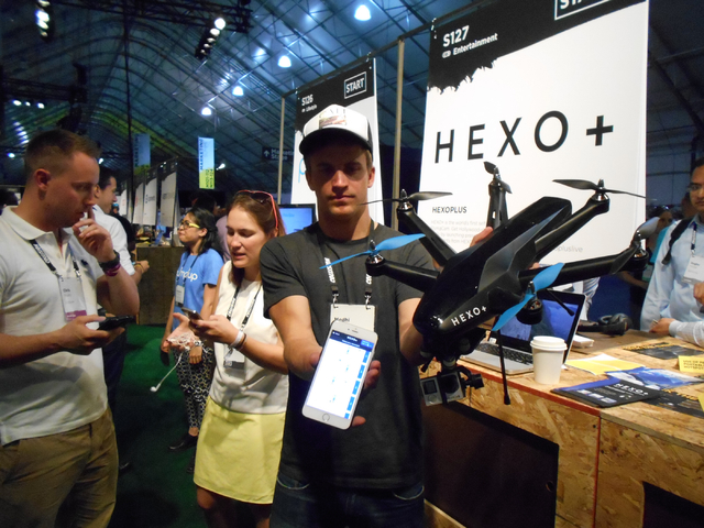 Medhi Mugnier of HEXO+ shows the technology behind his company that allows a pre-set control to control drone camera during Collision Conference at World Market Center on Tuesday, May 5, 2015. The ...