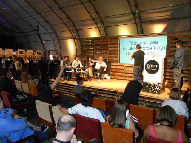 An unidentified startup company makes a pitch to unidentified investors at the Collision Conference at World Market Center on Tuesday, May 5, 2015. The conference was held to allow startup compani ...