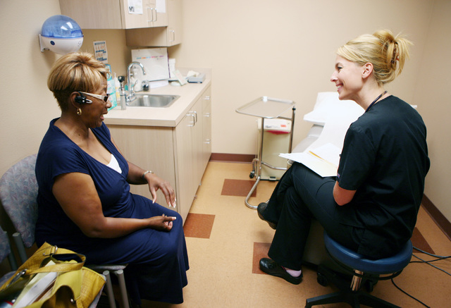Patient Linda Green, left, speaks with registered nurse Brandee Newson, who is also a Nurse Practicioner student, during an appointment at Volunteers in Medicine of Southern Nevada, 4770 Harrison ...