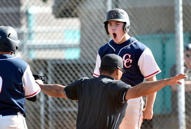 Coronado High School's Nate Ruiz reacts after sliding safely across homeplate during a first round game in the Sunrise Region baseball tournament against Silverado at Silverado High School on Tues ...