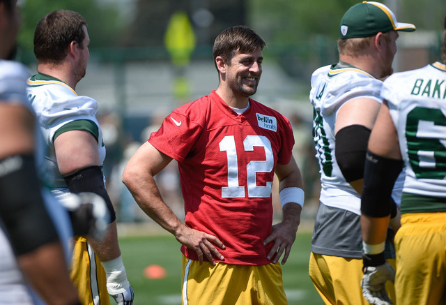 May 28, 2015; Green Bay, WI, USA; Green Bay Packers quarterback Aaron Rodgers (12) gets ready during Rookie Orientation Camp and Organized Team Activities at the Don Hutson Center in Green Bay. (B ...