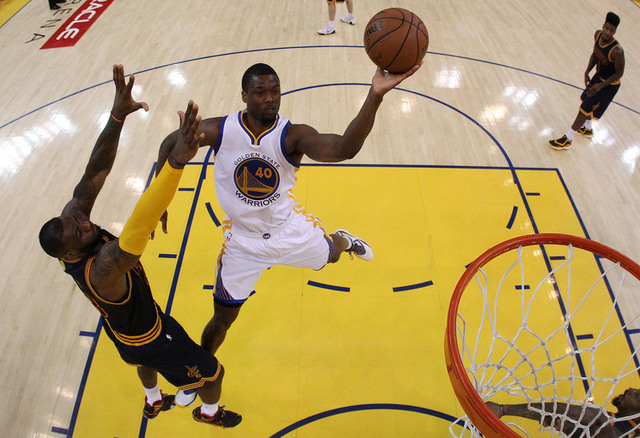 Jun 14, 2015; Oakland, CA, USA; Golden State Warriors forward Harrison Barnes (40) shoots the ball against Cleveland Cavaliers forward LeBron James (23) in game five of the NBA Finals at Oracle Ar ...