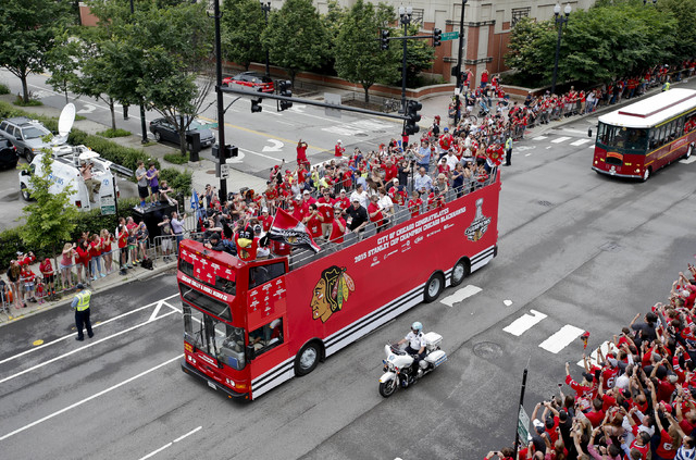 Jun 18, 2015; Chicago, IL, USA; Members of the Chicago Blackhawks during  the 2015 Stanley Cup championship parade and rally in Chicago. (Kamil  Krzaczynski-USA TODAY Sports)