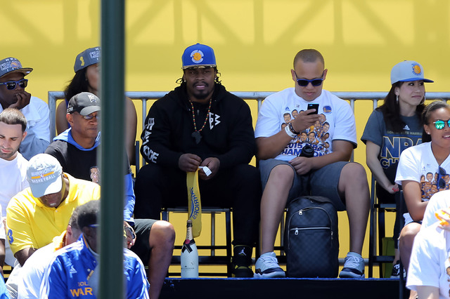 Jun 19, 2015; Oakland, CA, USA; Seattle Seahawks running back and Oakland native Marshawn Lynch during the Golden State Warriors 2015 championship celebration at the Henry J. Kaiser Convention Cen ...