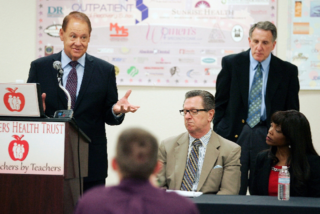 Terry Van Noy, a management consultant, left, answers questions Tuesday during a news conference at the Teachers Health Trust headquarters, at 2950 E. Rochelle Ave. in Las Vegas, March 20, 2013.