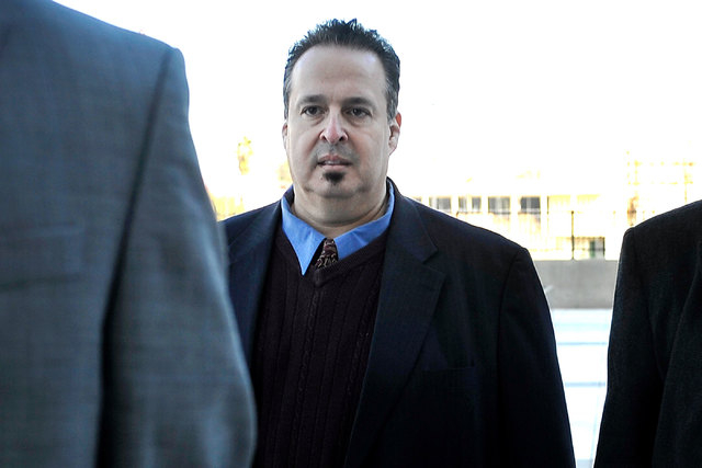 Leon Benzer, the alleged mastermind of the scheme to take over homeowner associations, arrives at the Lloyd George U.S. Courthouse on Friday, Jan. 23, 2015. (David Becker/Las Vegas Review-Journal)