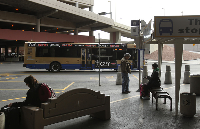 A Regional Transportation Commission of Southern Nevada bus makes a stop in 2014 at Terminal One at McCarran International Airport. The RTC recommends arriving at the bus stop no more than 10 minu ...