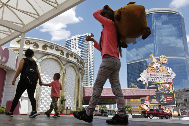 A family walks into Circus Circus on Wednesday, June 10, 2015, in Las Vegas. Despite its shrinking revenue, Circus Circus remains a popular destination for families. (James Tensuan/Las Vegas-Revie ...