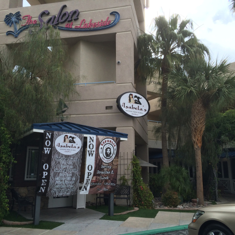 Signs announcing the new eateries at Desert Shores are seen May 18, 2015. The neighborhood shopping center has seen single restaurants attempt to gain a foothold in the center, but this is the fir ...