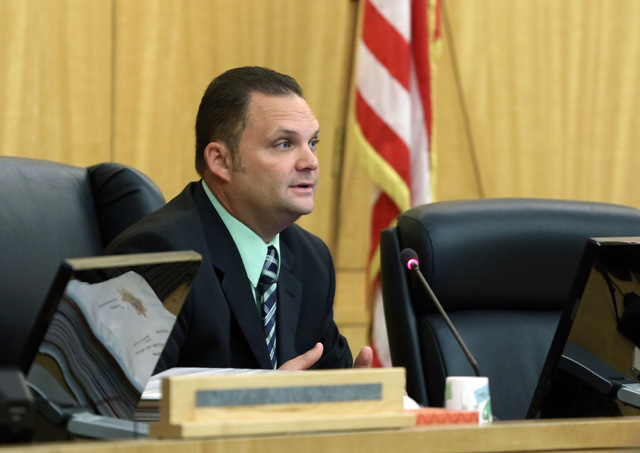 Metro Detective Ryan Jaeger answers questions during a police fact finding review at Clark County Government Center Wednesday, June 10, 2015, in Las Vegas. The review covered details of an officer ...