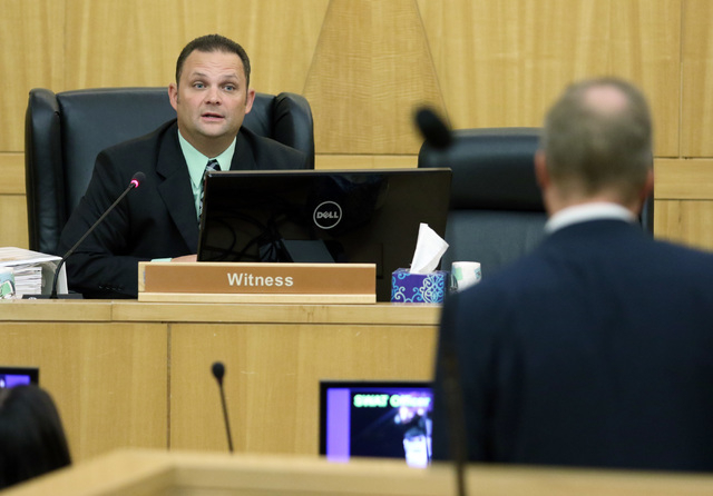 Metro Detective Ryan Jaeger, left, is questioned by Chief Deputy District Attorney Frank Cuomo during a police fact finding review at Clark County Government Center Wednesday, June 10, 2015, in La ...