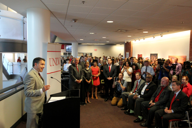 Governor Brian Sandoval speaks to bill signing attendees at UNLV on Thursday, June 10, 2015, in Las Vegas. The bill provides funds for UNLV's law, medical, business and hotel schools. (James Tensu ...