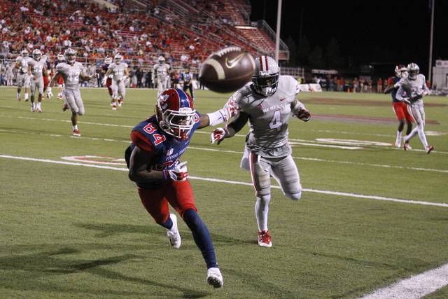 UNLV defensive back Sidney Hodge defends Fresno State wide receiver LeKendrick Williams on a pass play during the second half of their game Friday, Oct. 10, 2014 at Sam Boyd Stadium. UNLV won the ...