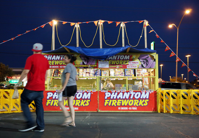 A Phantom Fireworks stand is open for business at the northeast corner of Flamingo Road and Rainbow Boulevard Tuesday, June 30, 2015, in Las Vegas. Volunteers worked at the 24-hour stand for WestC ...