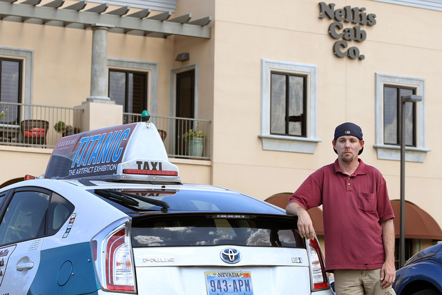 Taxi cab driver Greg Janz stands near a cab at Nellis Cab Co. headquarters, located at 5490 Cameron St., Tuesday, May 26, 2015, in Las Vegas. Last April, Janz turned in a media case that was left  ...