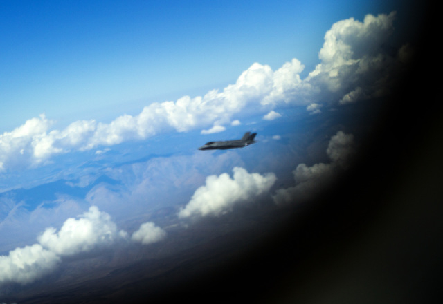 A F-35 Lightning II  from the 31st Test and Evaluation Squadron taken from a KC-135 Stratotanker Wednesday, June 10,2015  during a refueling exercise over Fort Irwin,Cal.  This was the first publi ...