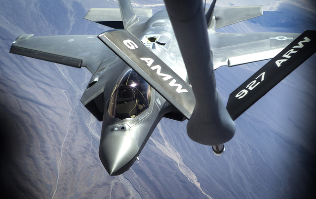 A F-35 Lightning II from the 31st Test and Evaluation Squadron during a refueling exercise over Fort Irwin,Cal. on Wednesday, June 10,2015. This was the first public refueling of the air force's n ...