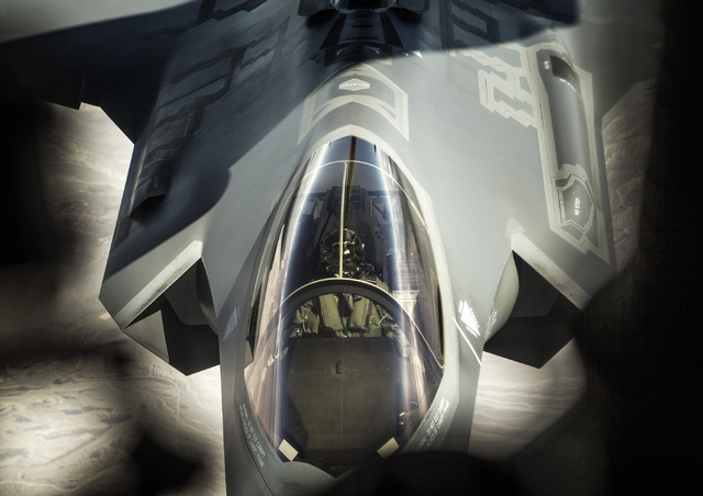 A F-35 Lightning II from the 31st Test and Evaluation Squadron during a refueling exercise over Fort Irwin,Cal. on Wednesday, June 10,2015. This was the first public refueling of the air force's n ...