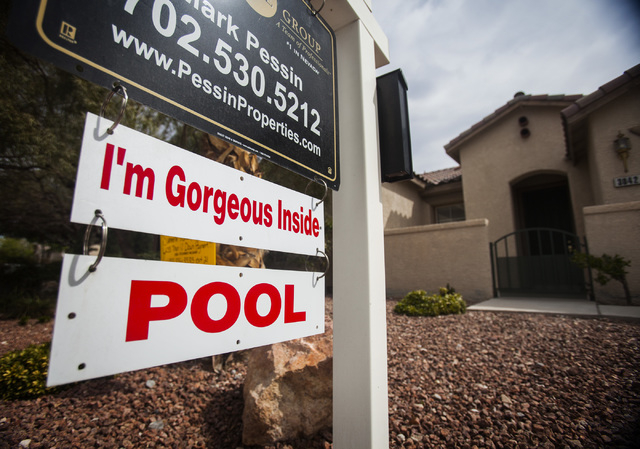 A 16-year-old home for sale at the Willows in Summerlin on Saturday, March 29, 2014. Home Builders Research reported Tuesday that builders across the Las Vegas Valley closed on 433 new homes in Fe ...