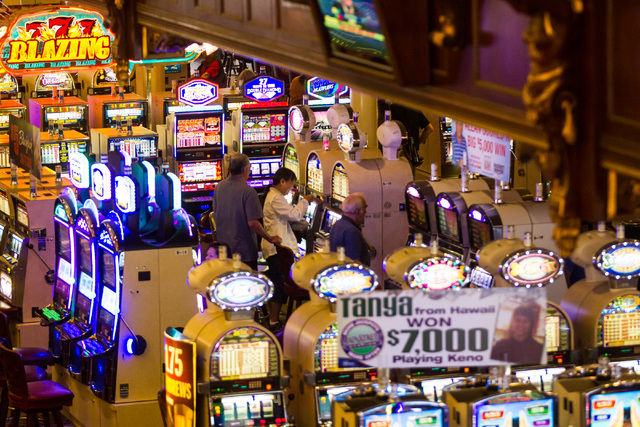 What downtown las vegas casino has iron man slot machine at atlantis resort