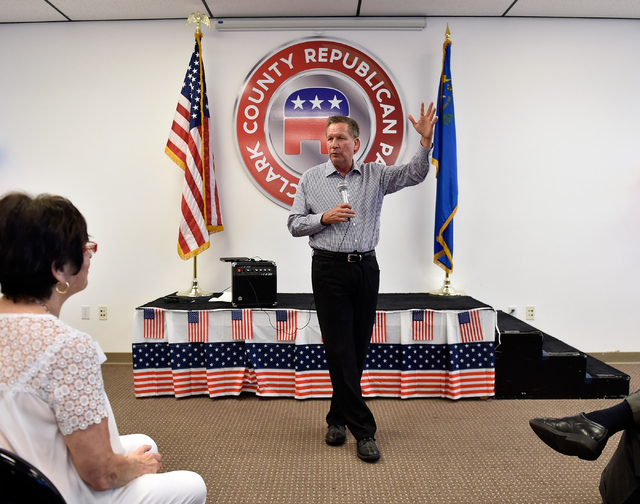 Ohio Gov. John Kasich speaks at the Clark County Republican Party headquarters in Las Vegas on Thursday, June 11, 2015. Kasich is traveling the country before he makes his final decision whether o ...