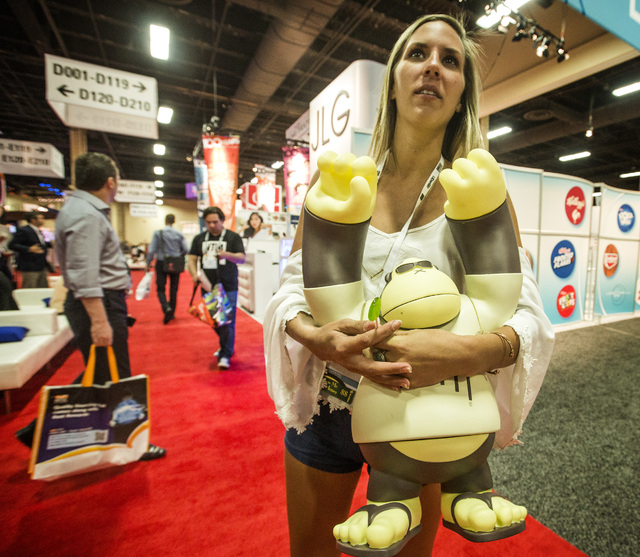 Devon Schorr holds Dun Bum during the Licensing Expo 2015 at the Mandalay Bay Convention Center, 3950 South Las Vegas Boulevard on Tuesday, June 9, 2015. Over 15,000 attendees from over 90 countri ...