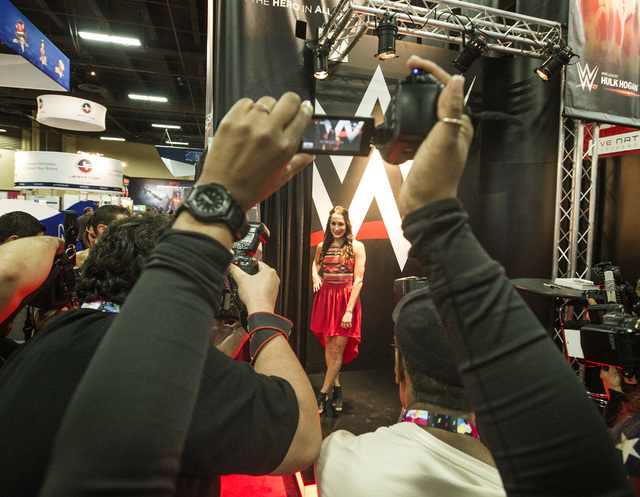 Brie Bella, reigning two-time World Wrestling Entertainment Divas Champion poises for photographers during the Licensing Expo 2015 at the Mandalay Bay Convention Center, 3950 South Las Vegas Boule ...