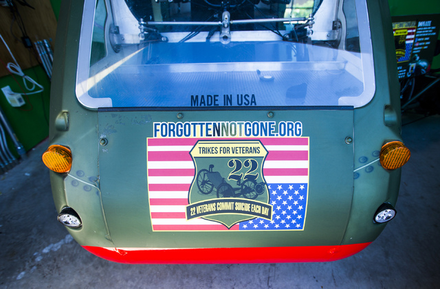 The logo of Forgotten Not Gone, 3355 Clayton Street, is seen Monday, June 22, 2015 on a tricycle. The nonprofit  provides trikes for veterans and their families to  reengage with society through e ...