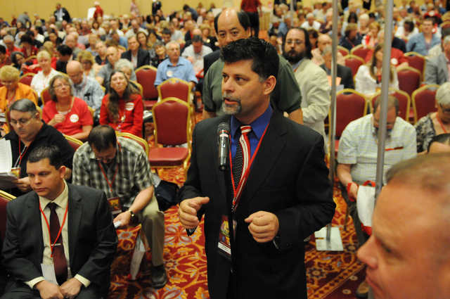 Bill Carns, committee chair at the Nevada Republican Party, speaks gives his opinion on an amendment during the annual Nevada Republican Party convention at the South Point casino-hotel in Las Veg ...