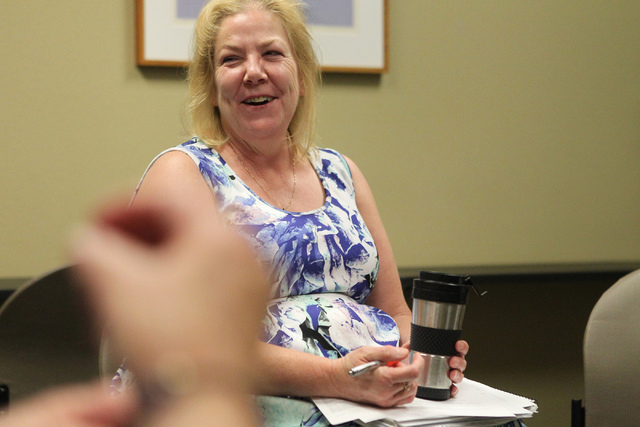 Laurie Moore Moss, peer counseling coordinator for the St. Rose Dominican Hospitals Peer Counseling program, speaks to fellow counselors during a meeting at the Barbara Greenspun WomensCare Center ...