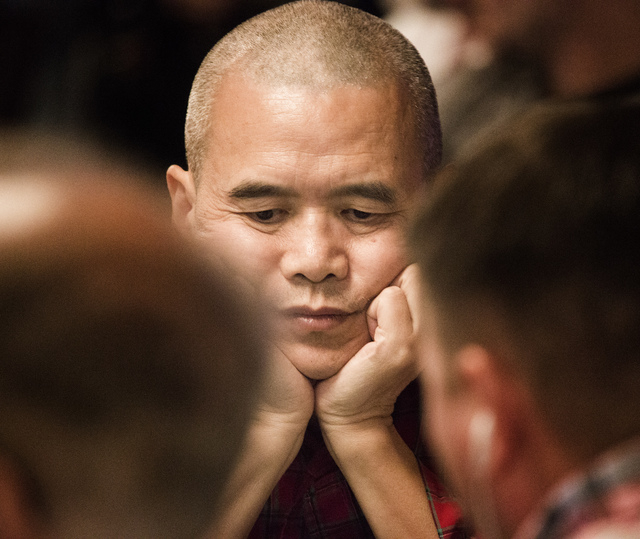 Poker player Dagang Wang studies the cards during the World Series of Poker at the Rio Convention Center 3700 West Flamingo Road on Friday, May 29, 2015. (Jeff Scheid/Las Vegas Review-Journal) Fol ...