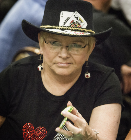 Poker player Susie Isaacs prepares to place a bet during the World Series of Poker at the Rio Convention Center 3700 West Flamingo Road on Friday, May 29, 2015. (Jeff Scheid/Las Vegas Review-Journ ...