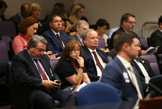Hundreds of lobbyists and other spectators listen to hearings as lawmakers rush to meet their midnight deadline at the Legislative Building in Carson City, Nev., on Monday, June 1, 2015. (Cathleen ...