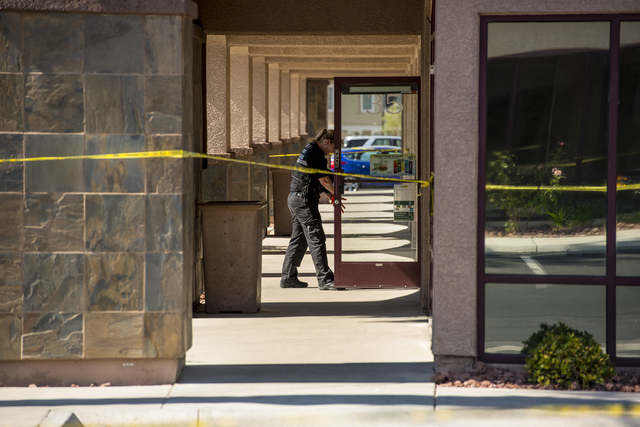 Las Vegas police investigate the scene of a shooting on the 8700 block of Maryland Parkway in Las Vegas on Wednesday, June 10, 2015. (Joshua Dahl/Las Vegas Review-Journal)