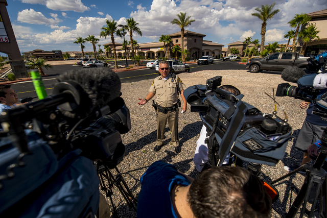 Lieutenant Troy Barrett of the Las Vegas Police Department addresses media at the scene of a shooting on the 8700 block of Maryland Parkway in Las Vegas on Wednesday, June 10, 2015. (Joshua Dahl/L ...