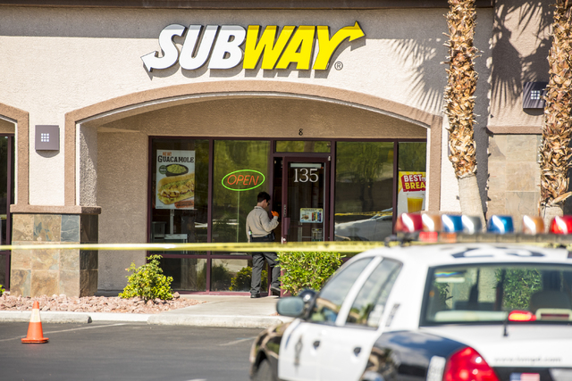 Las Vegas police investigate the scene of a shooting on the 8700 block of Maryland Parkway in Las Vegas on Wednesday, June 10, 2015. (Joshua Dahl/Las Vegas Review-Journal)