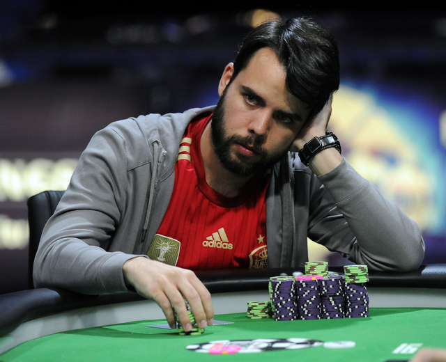 Poker player Javier Zarco of Madrid shuffles his chips during the final round of the $1.2 million Millionaire Maker tournament at the World Series of Poker at the Rio hotel-casino in Las Vegas Tue ...