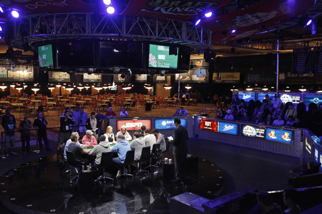 The last 10 poker players gather to compete in the Millionaire Maker at the Rio hotel-casino on Tuesday, June 9, 2015, in Las Vegas. Thousands had entered to compete in the Millionaire Maker. (Jam ...