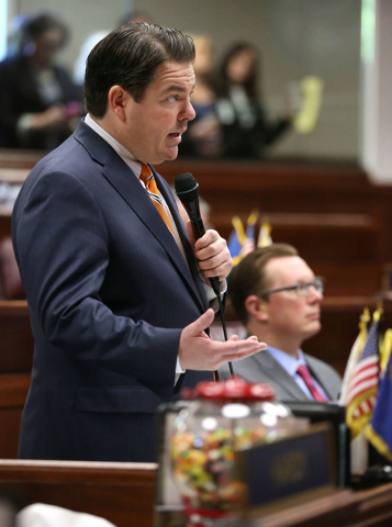 Nevada Senate Majority Leader Michael Roberson, R-Henderson, speaks in support of a record $1.1 billion general fund tax package during Senate floor discussion at the Legislative Building in Carso ...