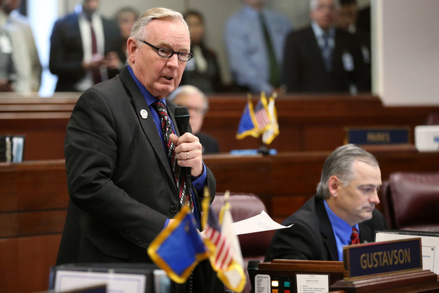 Nevada Sen. Don Gustavson, R-Sparks, speaks in opposition to a record $1.1 billion general fund tax package during Senate floor discussion at the Legislative Building in Carson City, Nev., on Mond ...