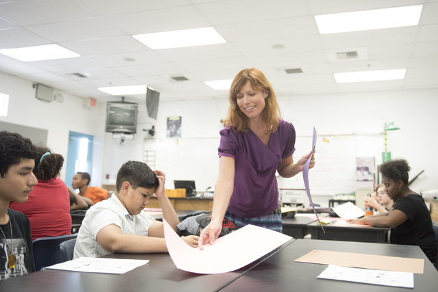Temple Forsythe, a student teacher, conducts a science lesson at John C. Fremont Middle School in Las Vegas, Friday, June 26, 2015. (Jason Ogulnik/Las Vegas Review-Journal)