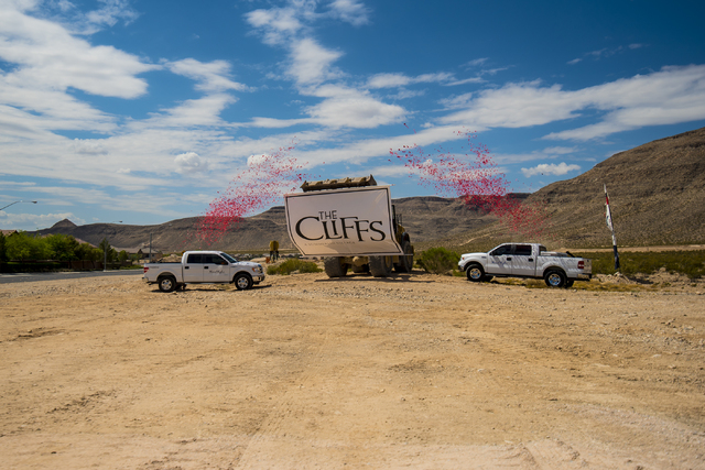 A banner is dropped during the groundbreaking ceremony of The Cliffs, a new development in Summerlin, in Las Vegas on Wednesday, June 10, 2015. (Joshua Dahl/Las Vegas Review-Journal)