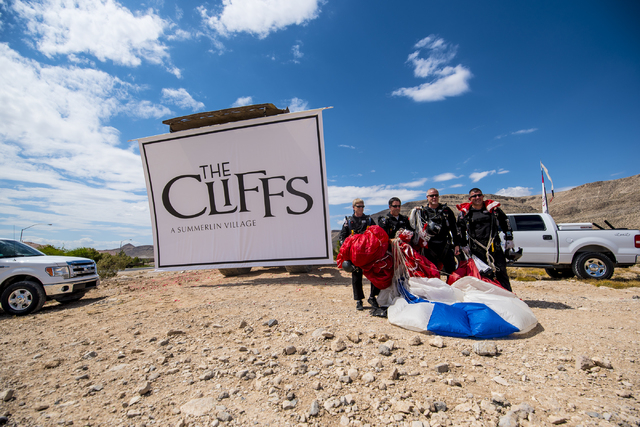 Skydivers pose for a photo after landing during the groundbreaking ceremony of The Cliffs, a new development in Summerlin, in Las Vegas on Wednesday, June 10, 2015. (Joshua Dahl/Las Vegas Review-J ...