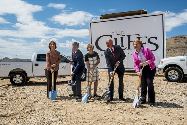 Peggy Chandler, senior vice president of Summerlin, from left, Tom Warden, vice president of community and government affairs for the Howard Hughes Corp., Clark County Commissioner Susan Brager, K ...