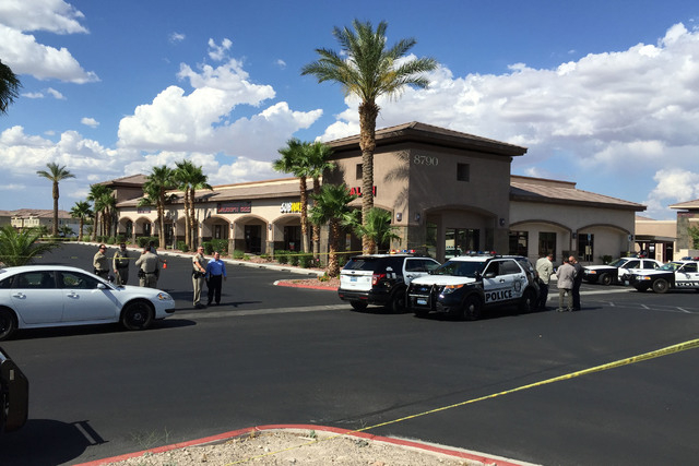 Police respond to the scene of a reported shooting near the intersection of Maryland Parkway between Wigwam Avenue and Pebble Road on Wednesday, June 10, 2015. One person was taken to University M ...